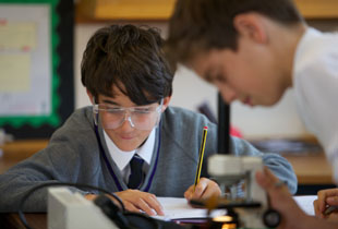 Pupils in a Physics lesson at Kimbotlon School