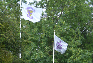 OKA and Kimbolton School Flags on Cricket Pavilion