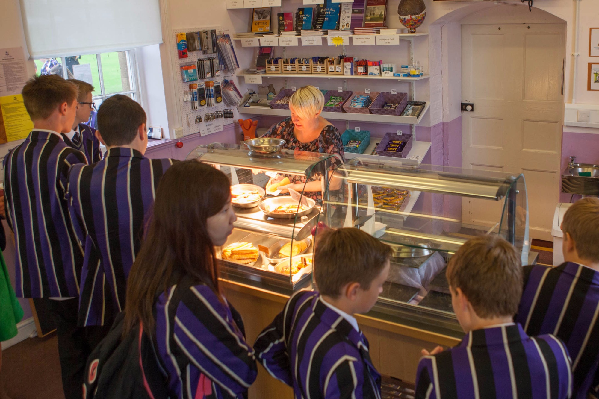 Pupils being served at Kimbolton School's School Shop